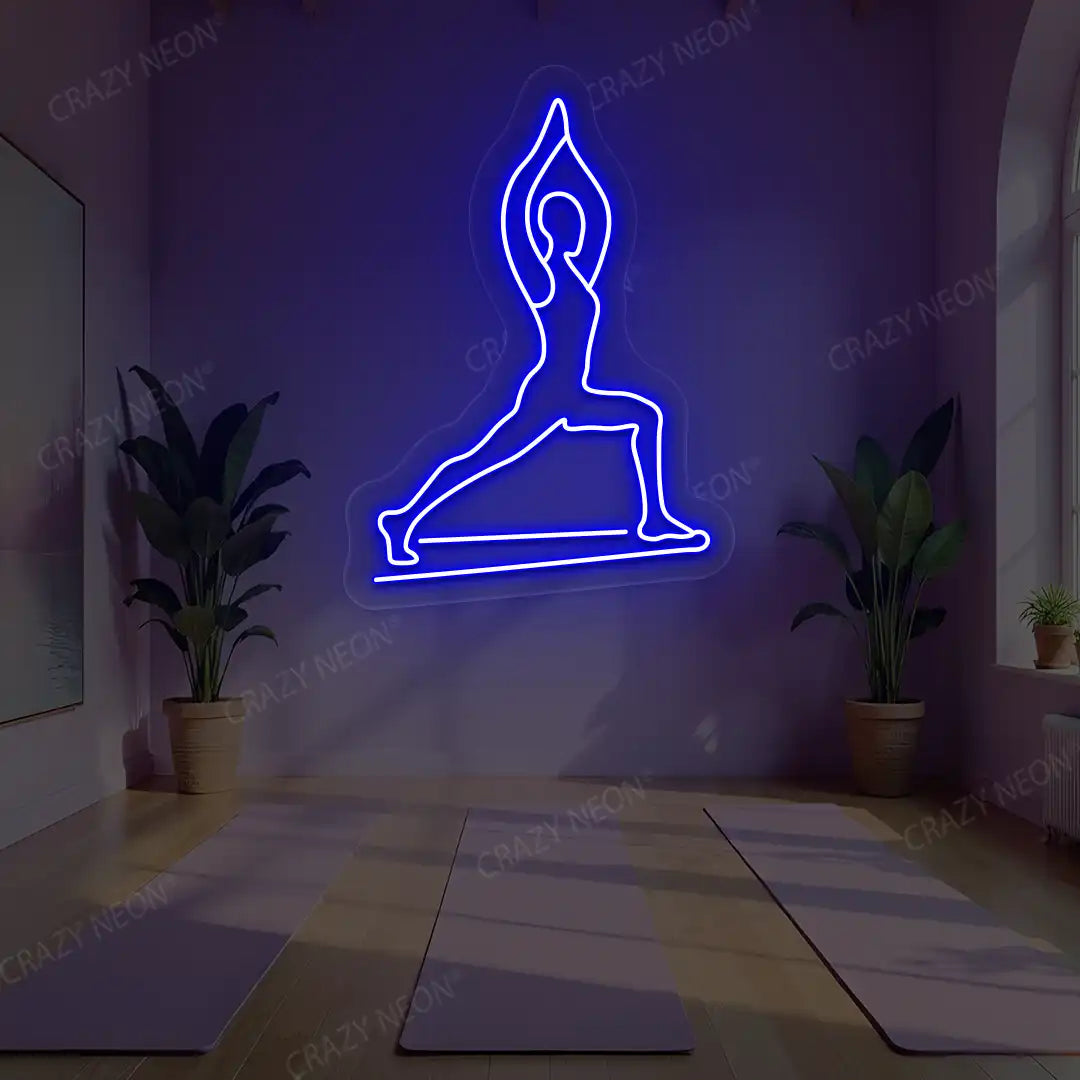 Virabhadrasana I Yoga Neon Sign lighting up in blue color in a yoga room