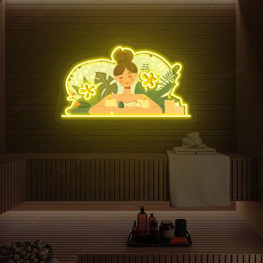 Aromatherapy Relaxation Neon Artwork lighting up in yellow color on a wooden spa wall