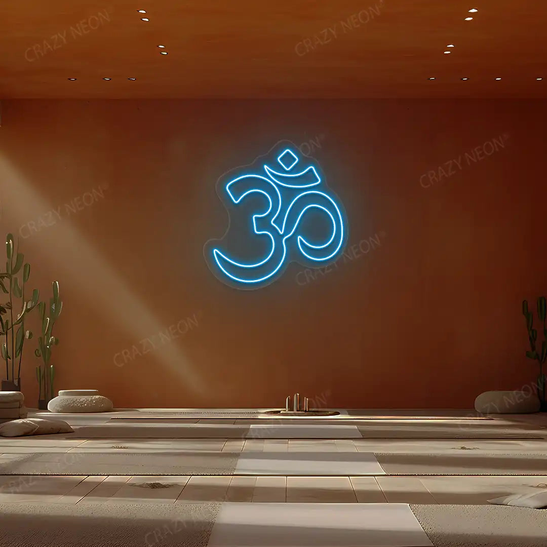 Om Symbol Neon Sign lighting up in iceblue color in a yoga room