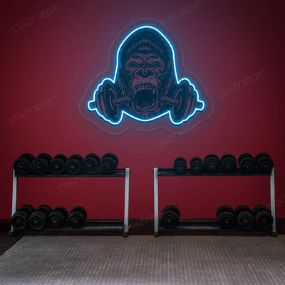 ice blue gorilla barbell gym neon artwork mounted on a wall