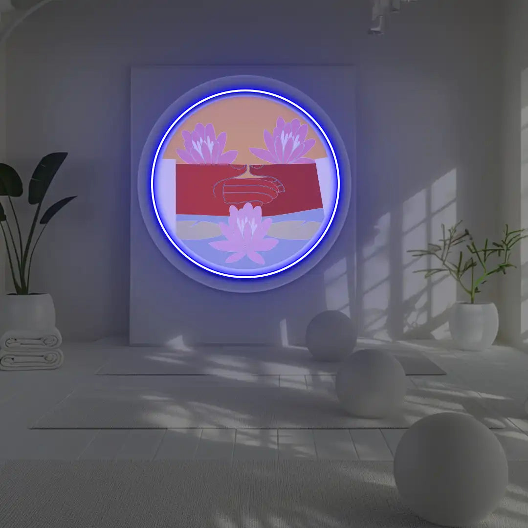 Dhyana Mudra Lotus Neon Artwork lighting up in blue color in a yoga room