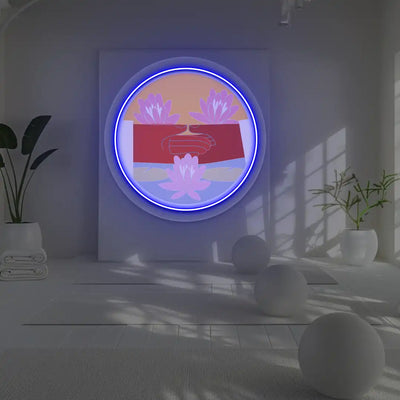 Dhyana Mudra Lotus Neon Artwork lighting up in blue color in a yoga room