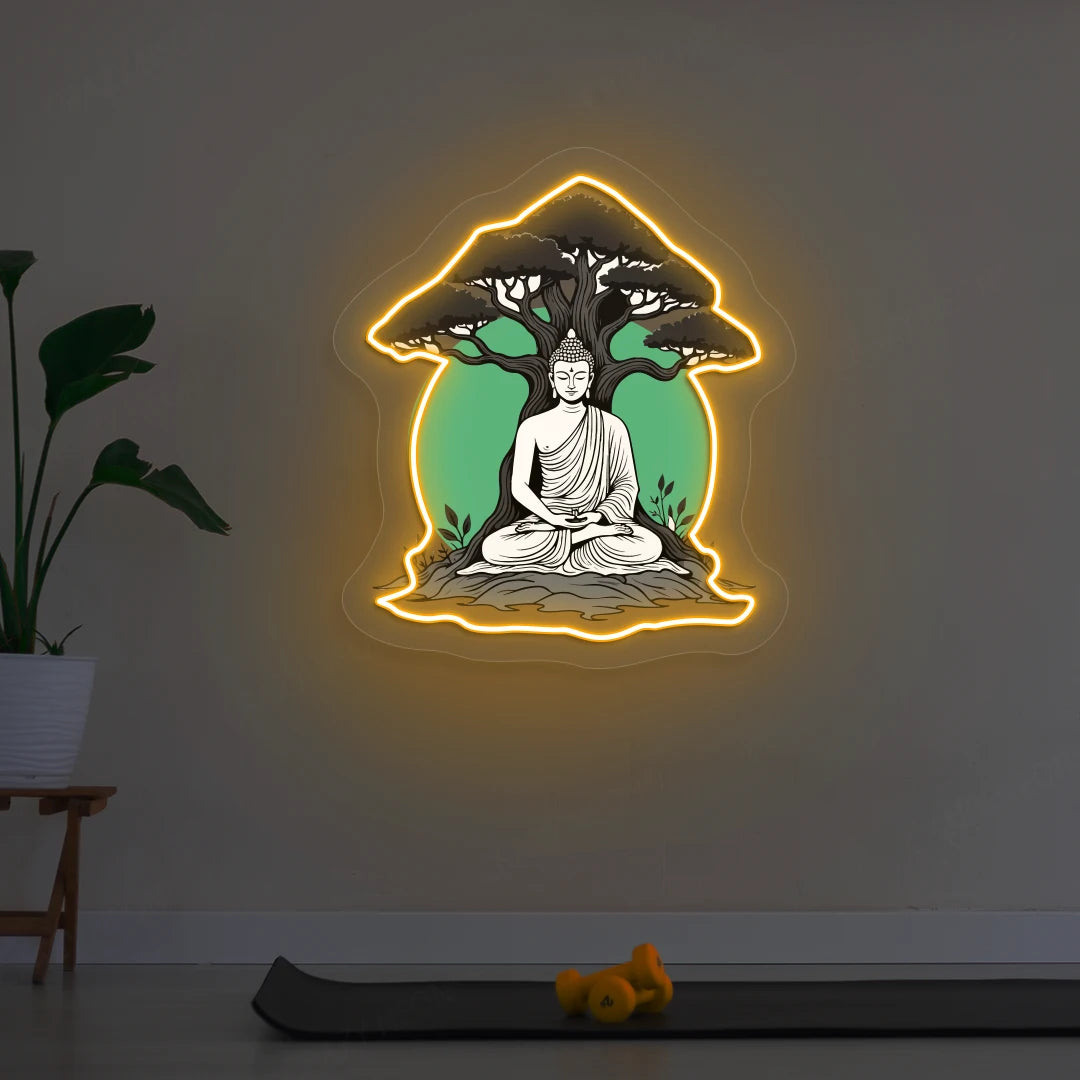 Buddha under Bodhi Neon Artwork lighting up in Orange color in room 