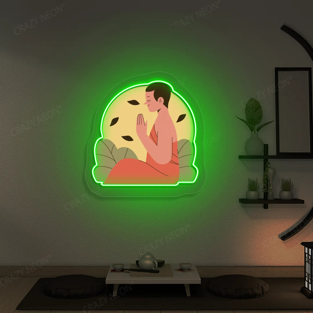 Serene Monk Neon Artwork lighting up in green color in a yoga room
