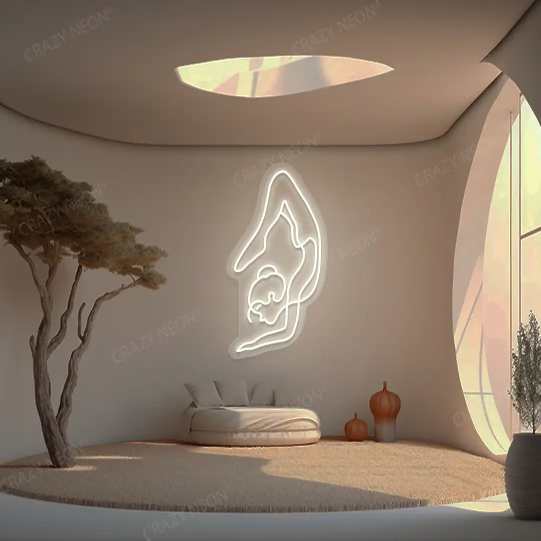 Purna Vrishchikasana Yoga Neon Sign glowing in warm white color in a yoga room