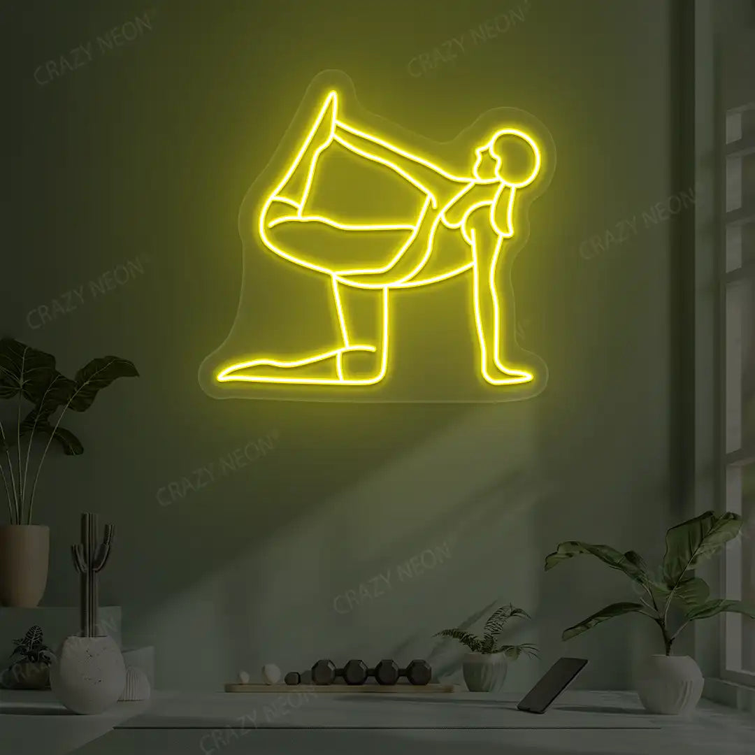 Ardha Dhanurasana Yoga Neon Sign glowing in yellow color in a yoga room