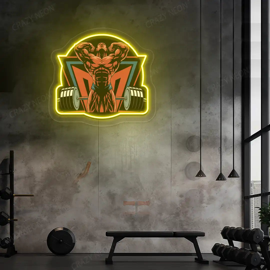 yellow powerlifter era gym neon artwork mounted on a wall