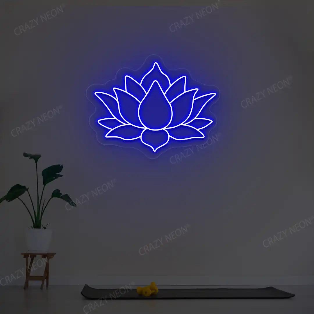 Lotus Flower Neon Sign lighting up in blue color in a yoga room