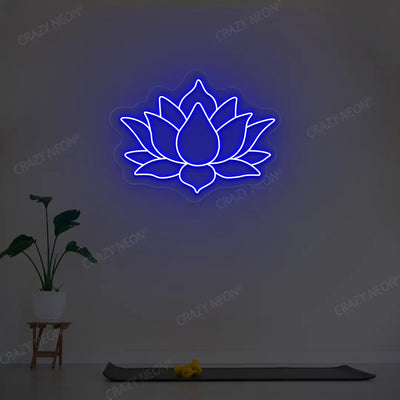 Lotus Flower Neon Sign lighting up in blue color in a yoga room