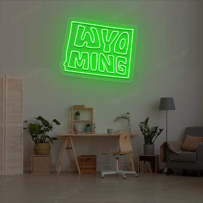 WYOMING Map Neon Sign lighting up in green color in a room