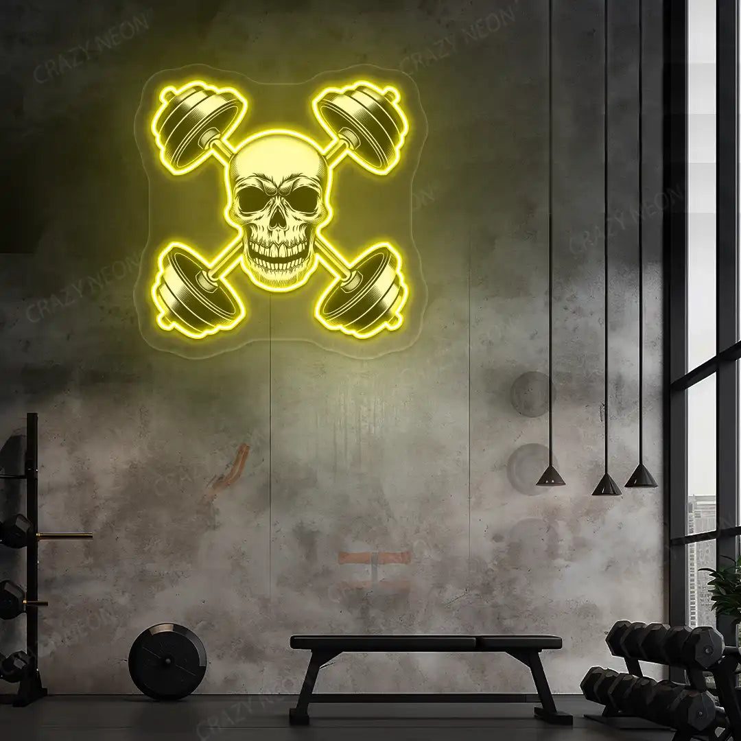 yellow skull cross dumbbell gym neon artwork mounted on a wall