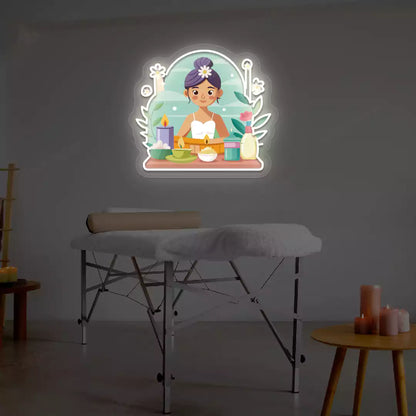 Spa Girl Neon Artwork lighting up in warm white color on a spa wall