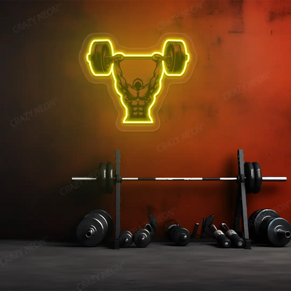 yellow barbell overhead press gym neon artwork mounted on a wall 