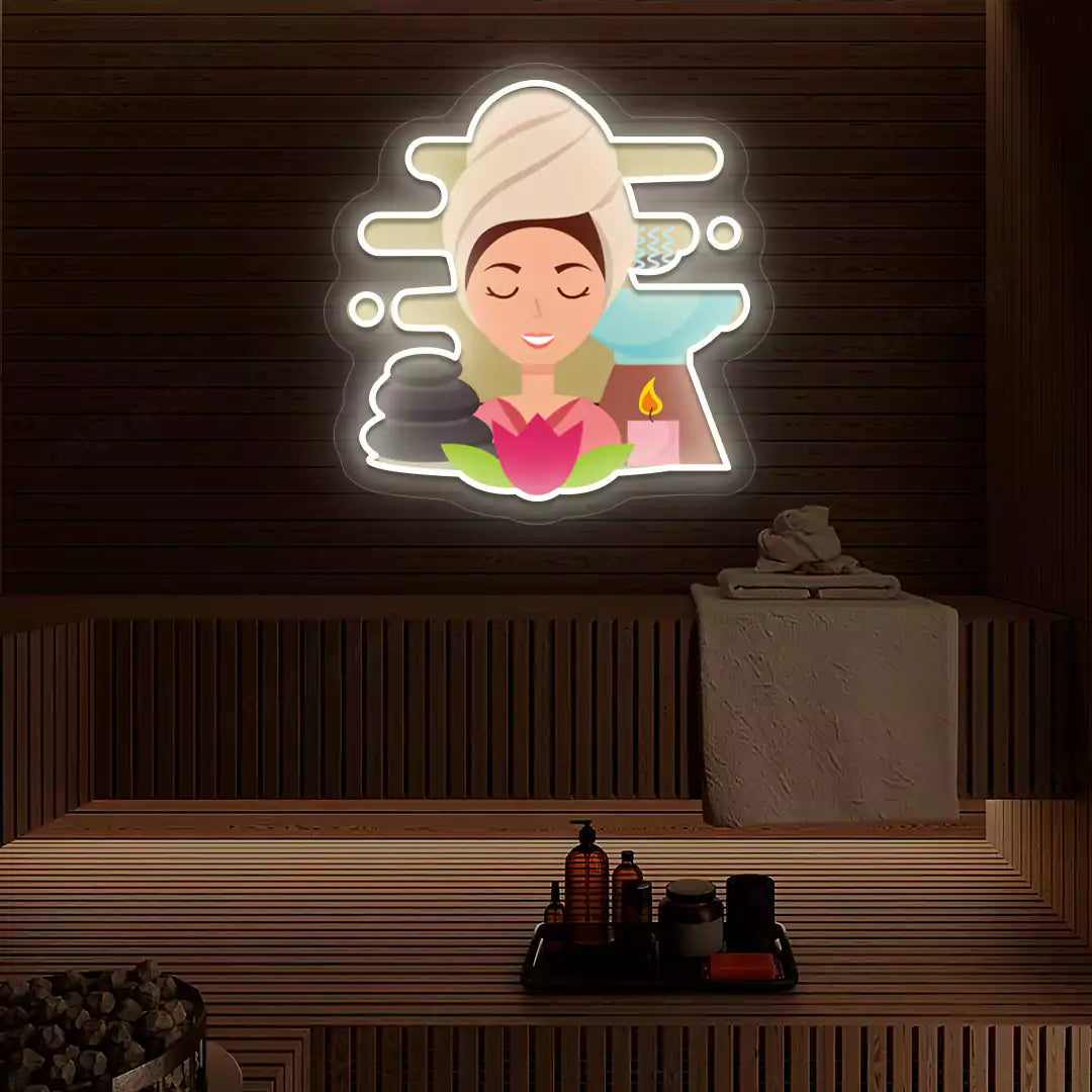 Steam Wellness Neon Artwork lighting up in warm white color on a wooden spa wall