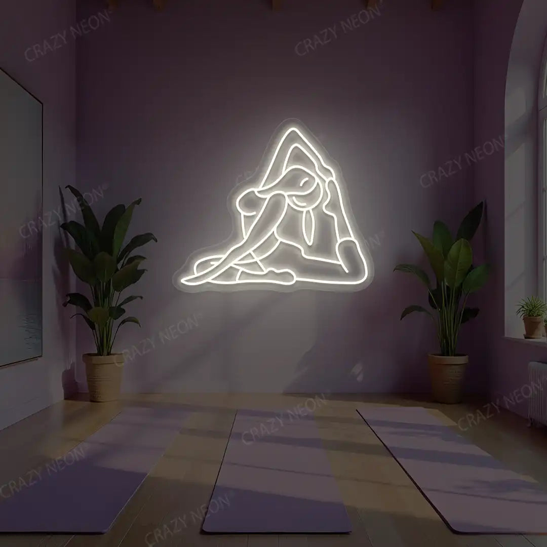 Eka Pada Rajakapotasana Yoga Neon Sign lighting up in warm white color in a yoga room
