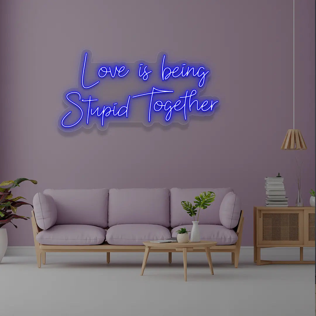 Love Is Being Stupid Together Neon Sign in Blue Color 