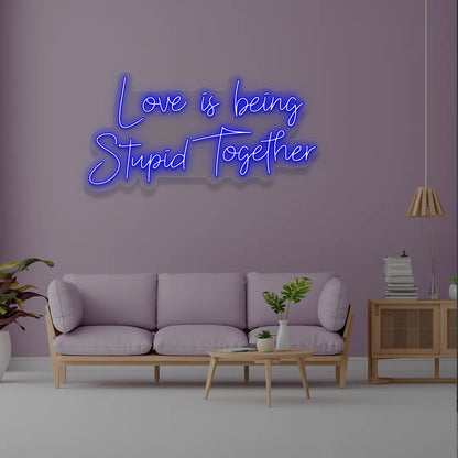 Love Is Being Stupid Together Neon Sign in Blue Color 