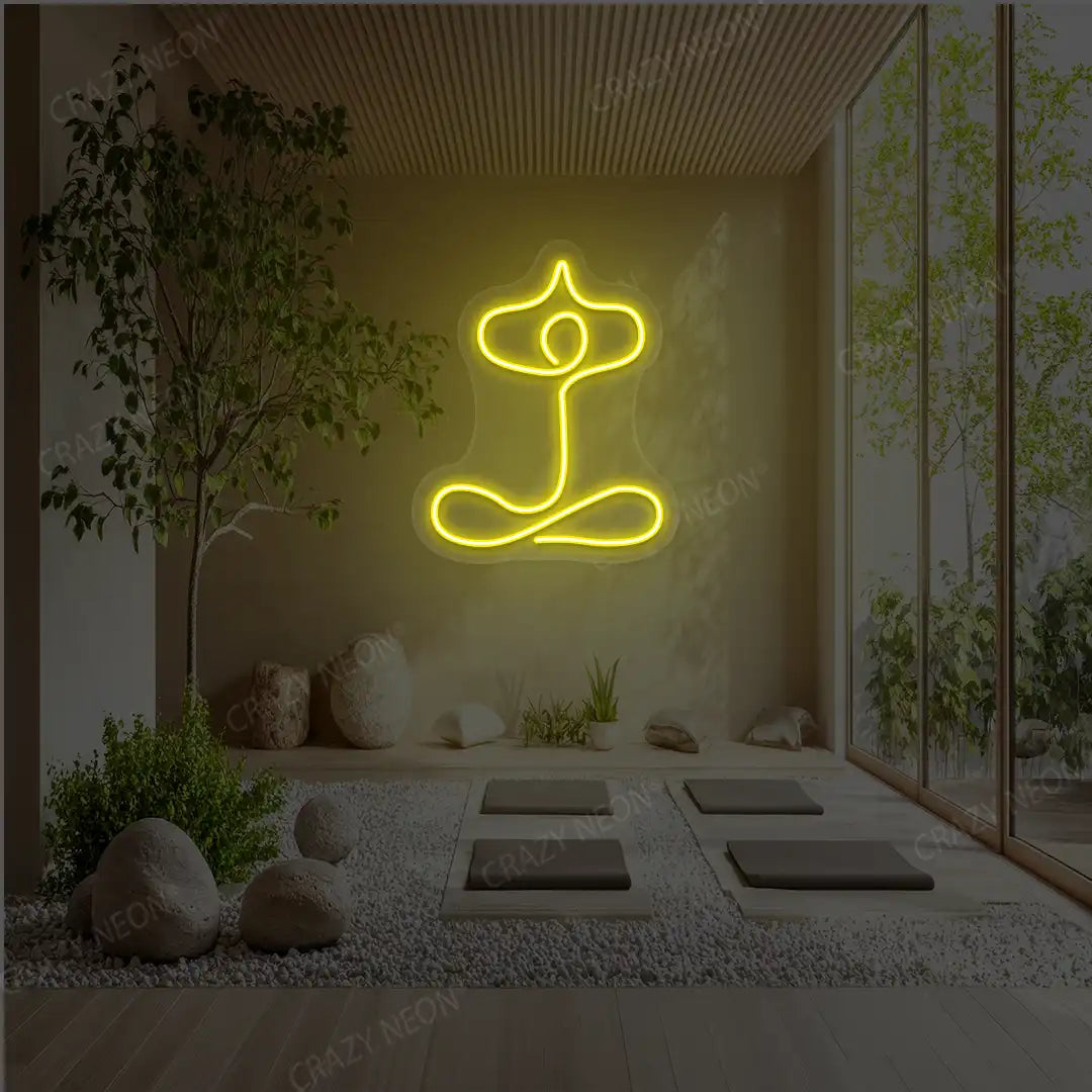 Sukhasana With Arms Raised Contour Yoga Neon Sign glowing in yellow color in a yoga room