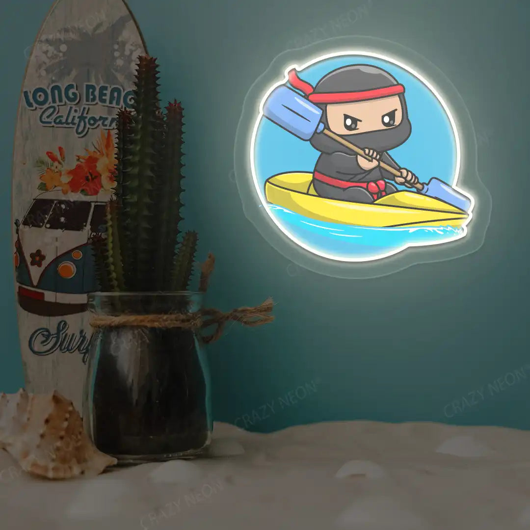warm white ninja kayaking neon artwork mounted on a wall