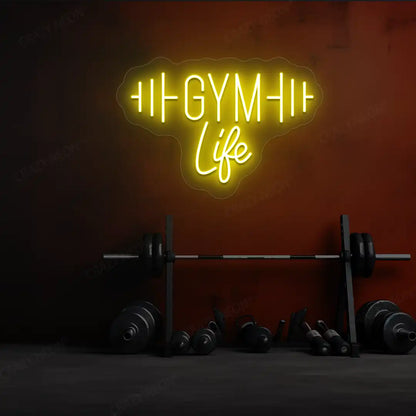 yellow gym life neon sign mounted on a wall