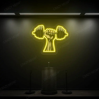 yellow hand lifting dumbbell gym neon artwork mounted on a wall