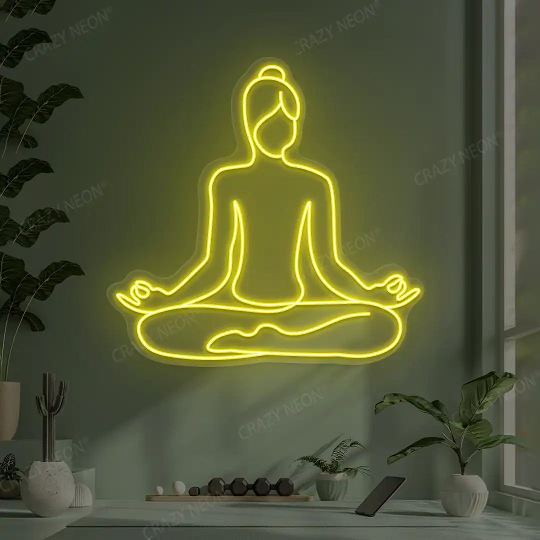 Swastikasana Contour Yoga Neon Sign lighting up in yellow color in a yoga room