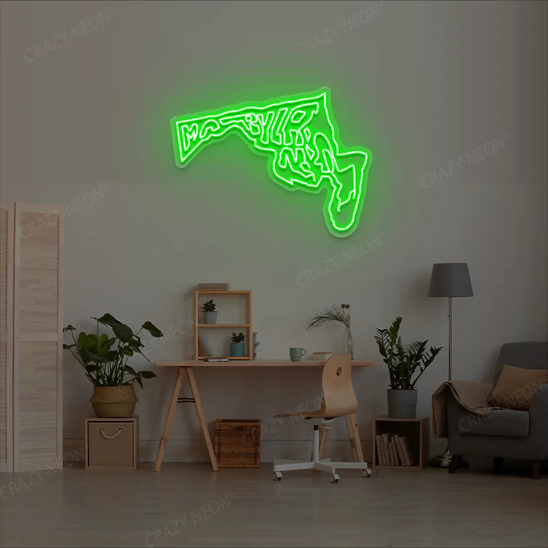 MARYLAND Map Neon Sign lighting up in green color in a room