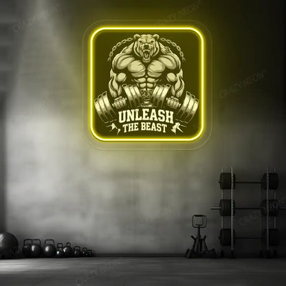 yellow unleash the beast bear neon artwork mounted on a wall