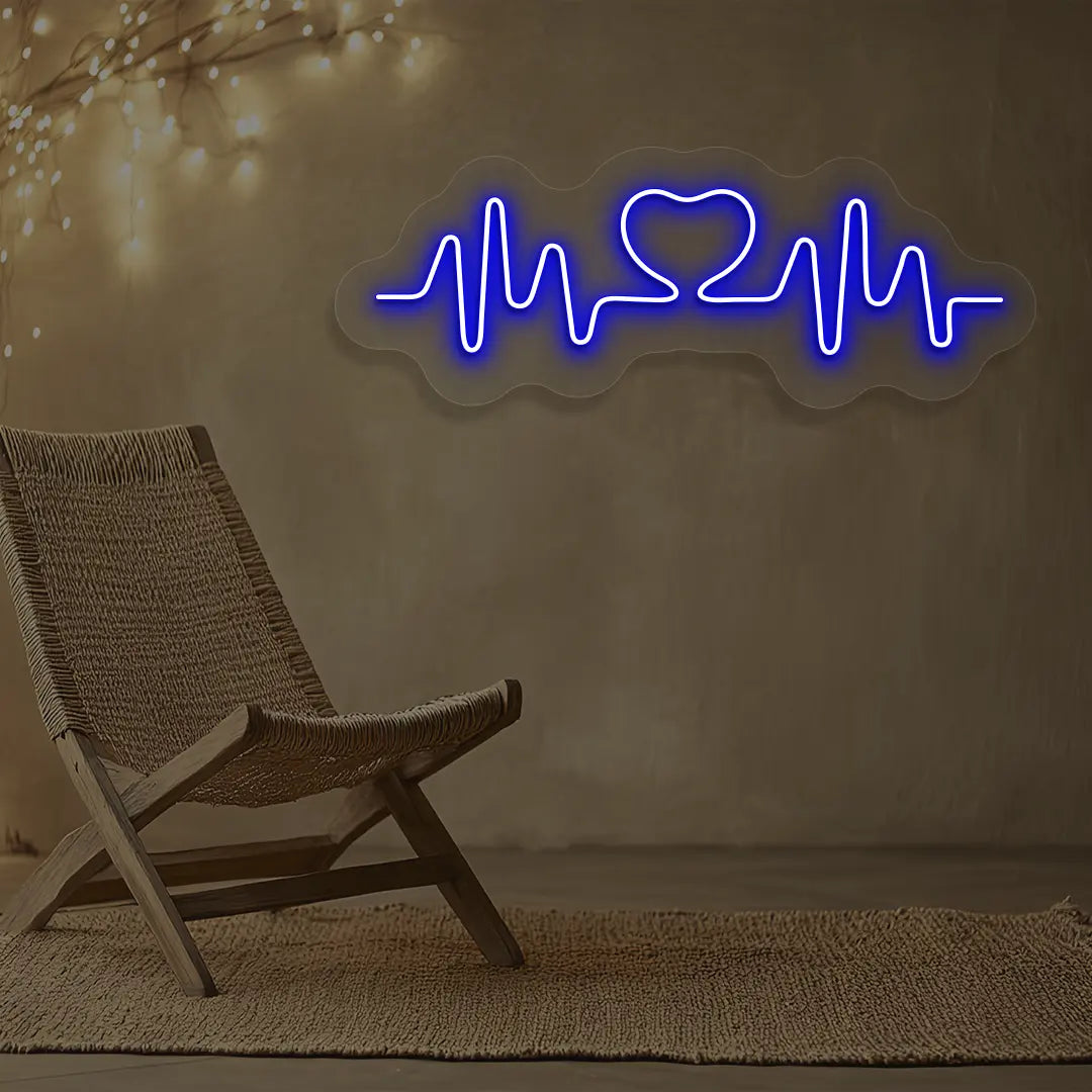 blue love pulse neon sign mounted on a wall