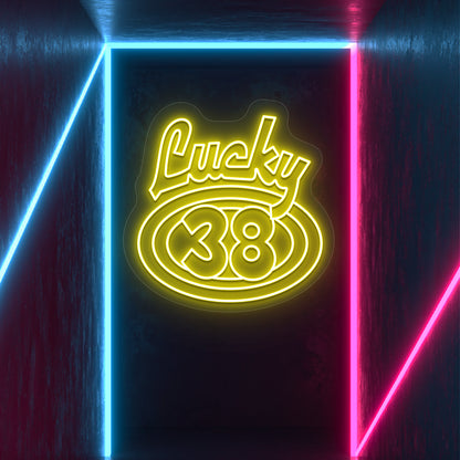 yellow the lucky 38 vintage neon sign mounted on a wall
