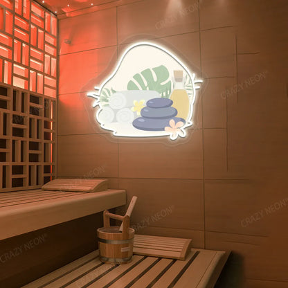 Spa Stones & Serenity Neon Artwork lighting up in warm white color on a wooden wall