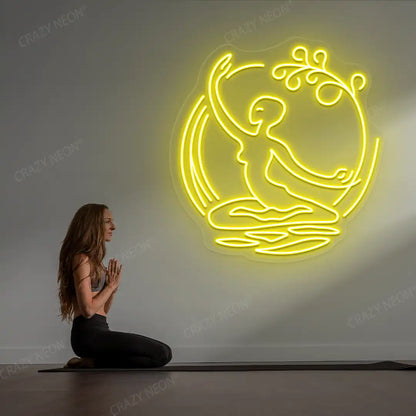 Chi Flow meditation Neon Sign lighting up in yellow color in a yoga room