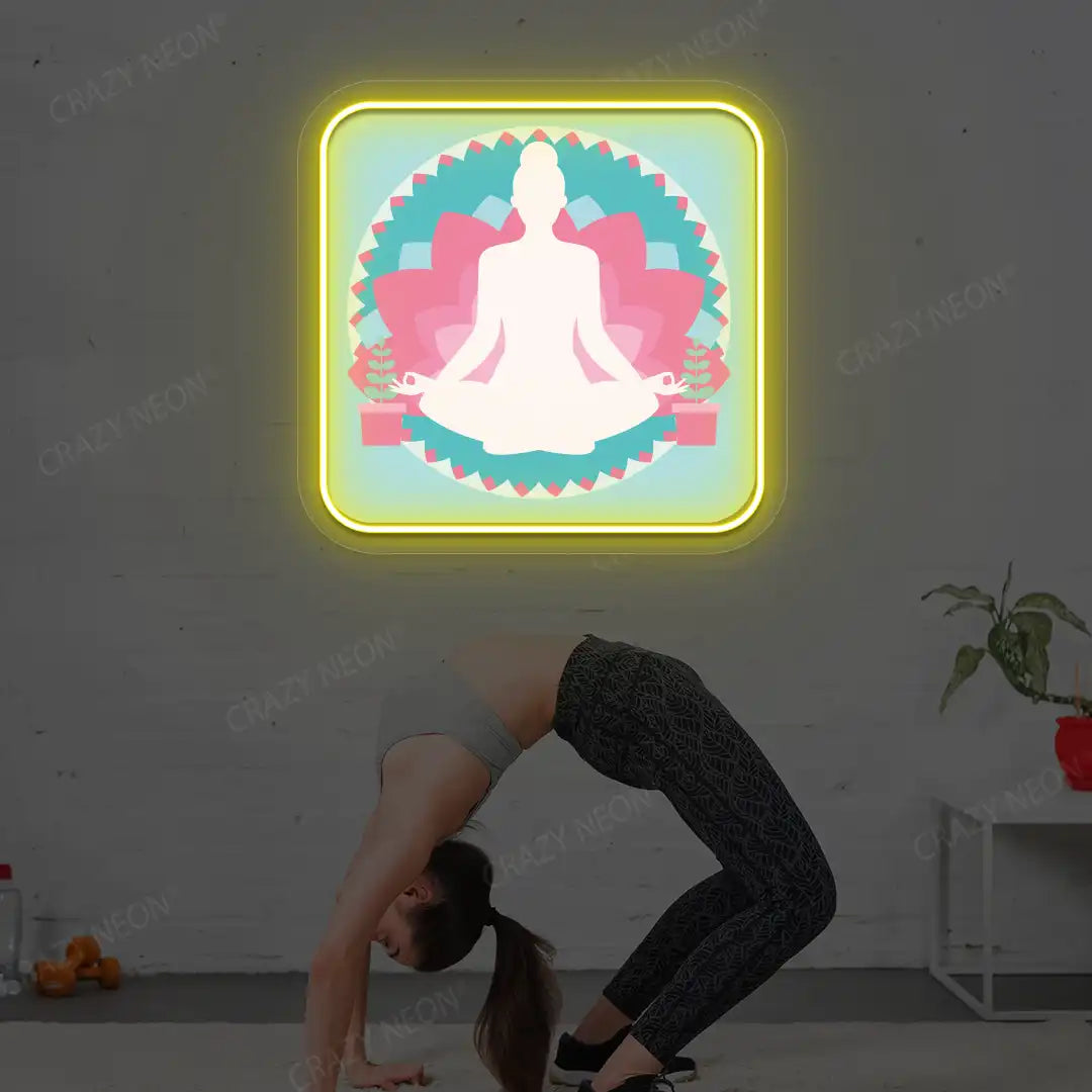 Padmasana Mandala Yoga Neon Artwork lighting up in yellow color in a yoga room