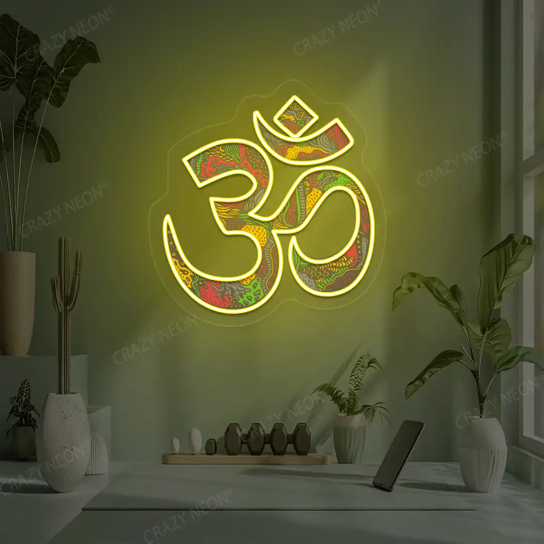 Psychedelic OM Neon Artwork lighting up in yellow color in a yoga room