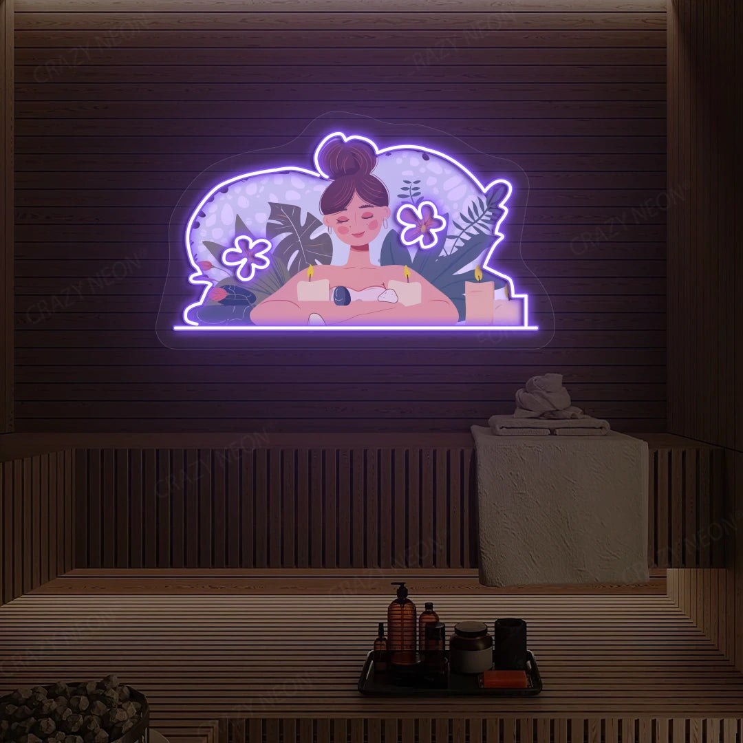 Aromatherapy Relaxation Neon Artwork lighting up in purple color on a wooden spa wall