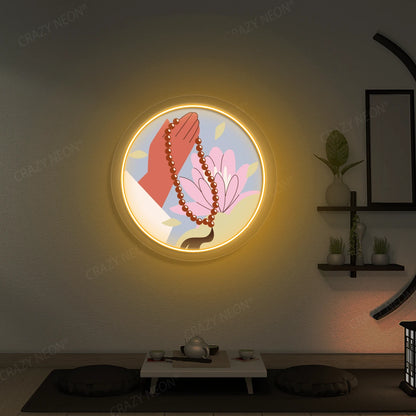 Lotus Japa Neon Artwork lighting up in orange color in a yoga room