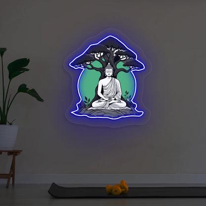 Buddha under Bodhi Neon Artwork lighting up in Blue color in room