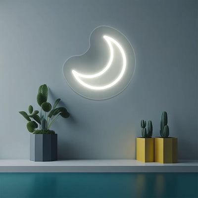 A glowing warm white crescent moon neon sign is mounted on a light blue wall