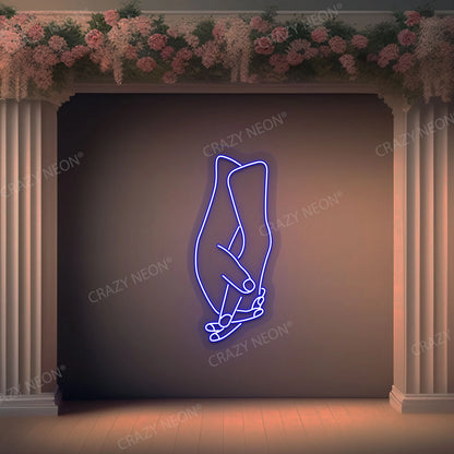 Hands Holding Neon Sign