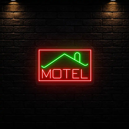 green and red classic stay motel vintage neon sign mounted on a wall