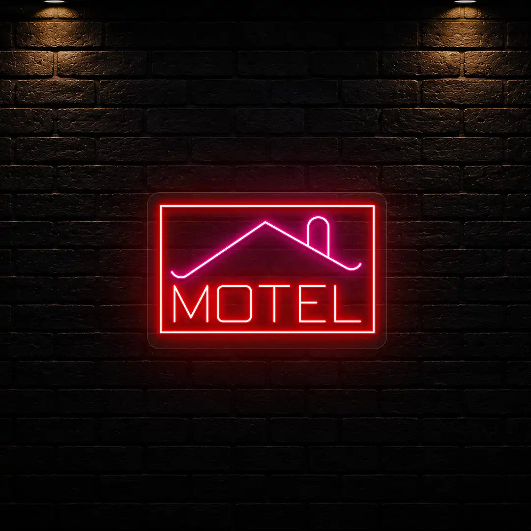 pink and red classic stay motel vintage neon sign mounted on a wall
