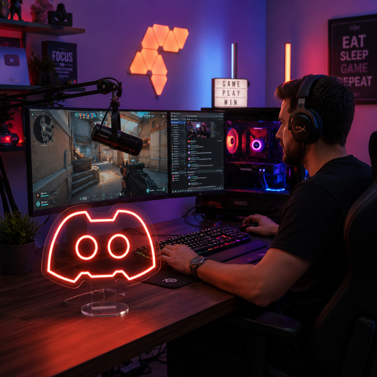 Red gaming icon neon lamp glowing on a gaming desk.