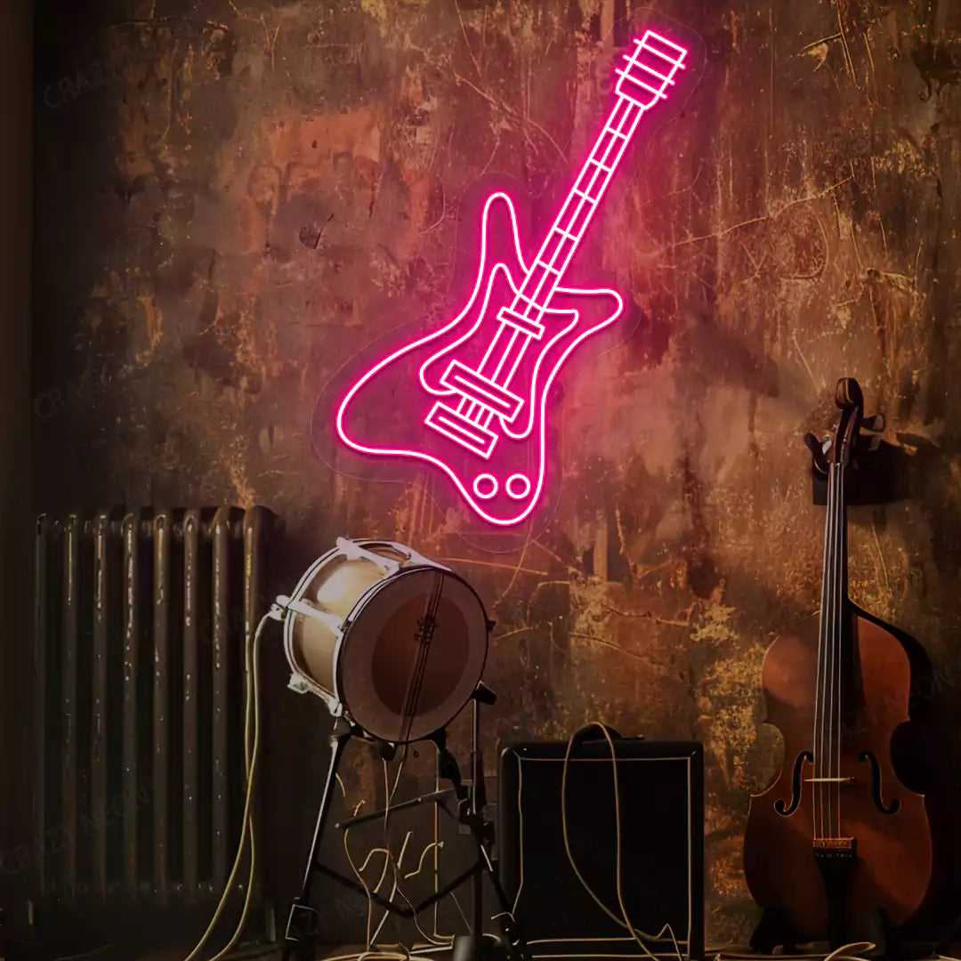 pink rock guitar neon sign mounted on a wall
