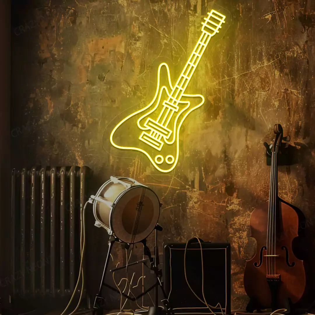yellow rock guitar neon sign mounted on a wall