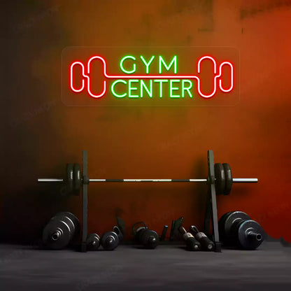 green and red gym center neon sign mounted on a wall