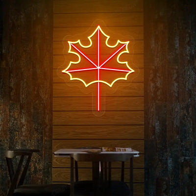 Maple leaf neon sign in red and yellow