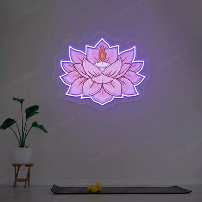 Lotus Candle Neon Artwork lighting up in purple color in a yoga room