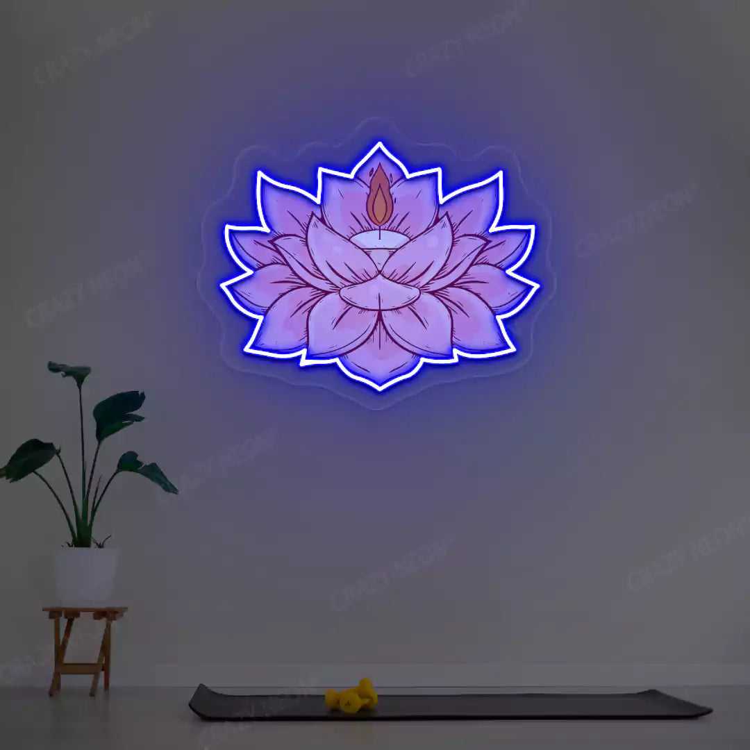 Lotus Candle Neon Artwork lighting up in blue color in a yoga room