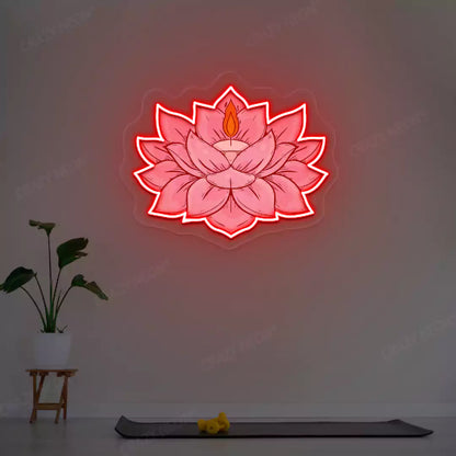 Lotus Candle Neon Artwork lighting up in red color in a yoga room