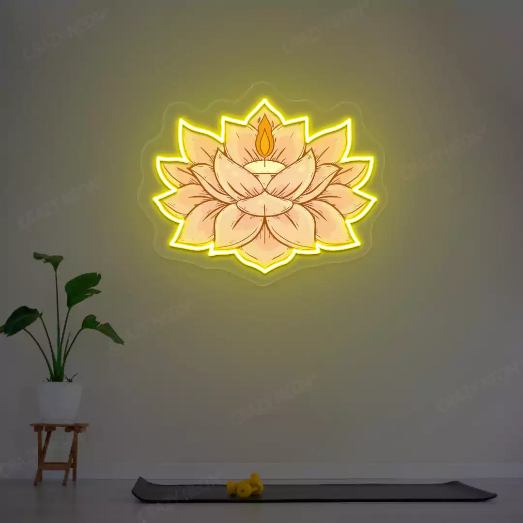 Lotus Candle Neon Artwork lighting up in yellow color in a yoga room
